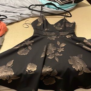 Francesca’s black and gold shimmer floral dress